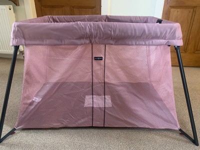pink travel cot
