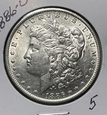 1886-O MORGAN SILVER DOLLAR, AU DETAILS 