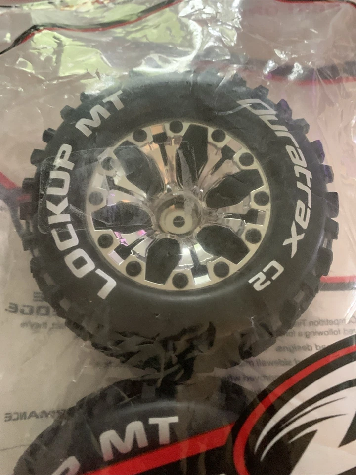 Duratrax Lockup MT C2 Pre-Assembled Chrome Wheel/Black Tire FT/RR DTXC3511 NEW - Image 3 of 4