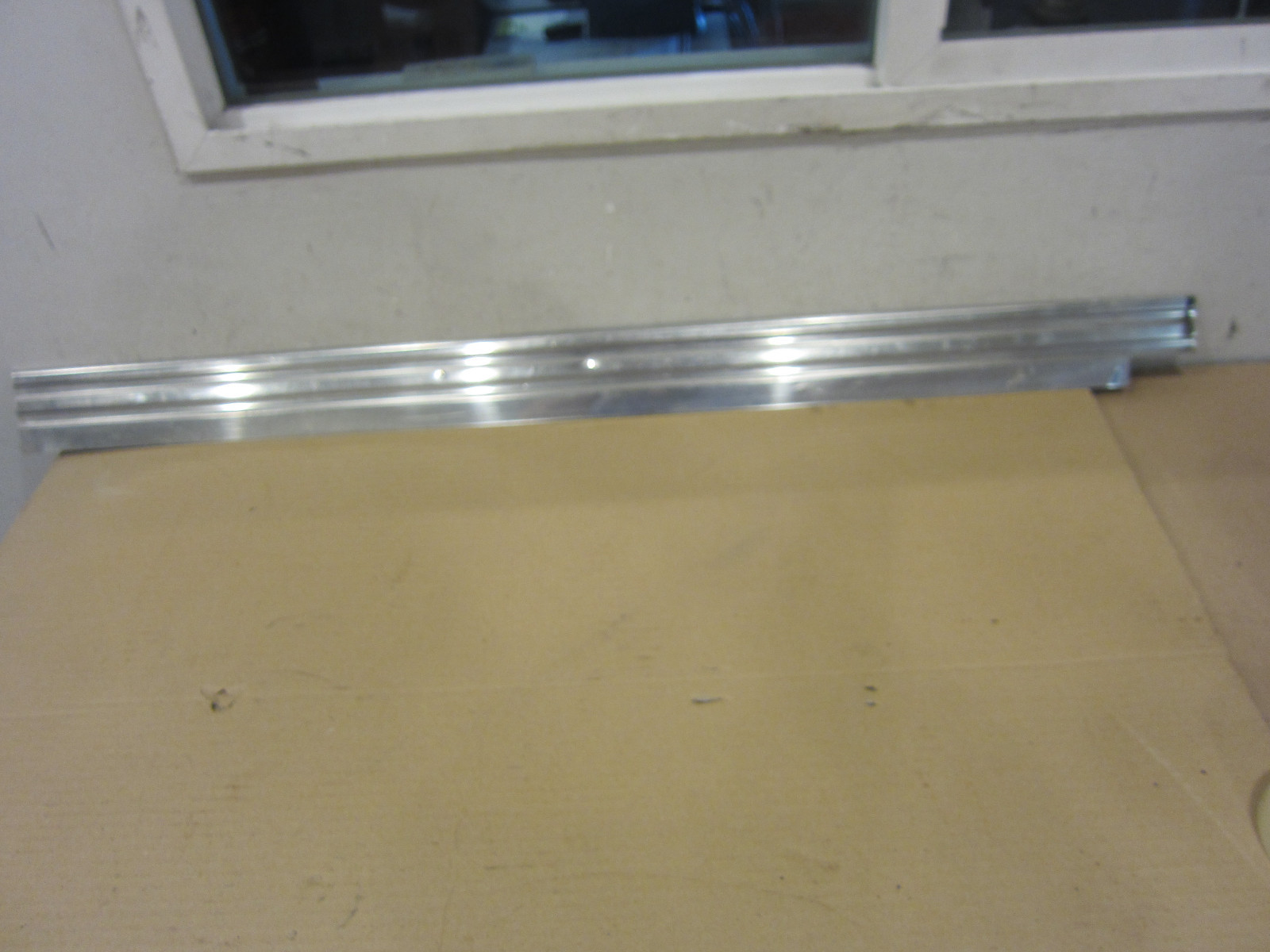 Ferrari Mondial - LH Under Door Molding / Sill Plate (USED) - P/N 60674900