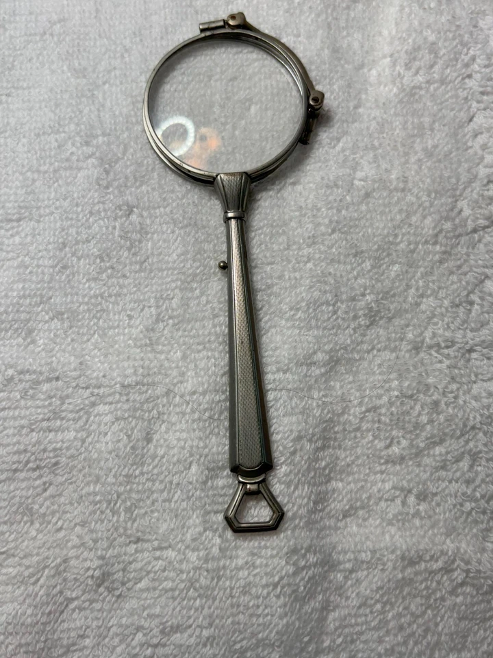 Gafas de ópera plegables Lorgnettes plateadas antiguas ornamentadas Foto 3 de 4