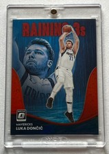 2022-23 Panini Optic #7 Raining 3's Red Prizm /99 Luka Doncic Dallas Mavericks