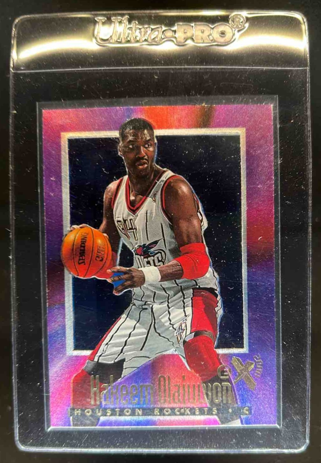 1996 Skybox EX-2000 Hakeem Olajuwon #25 Rockets