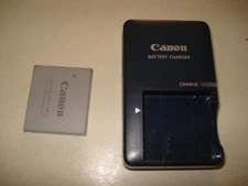 Genuine Canon Camera NB-4L Battery CB-2LV Charger 4 SD750 SD1000 Elph300 more