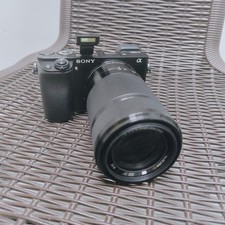 Sony Alpha A6000 24.3MP Mirrorless Digital Camera Black w/55-210mm Lens Black