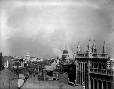 Smoke rises from behind the dome of St Pauls Cathedral after the f- Old Photo