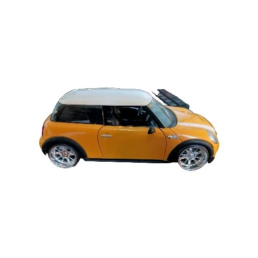 JADA DUB CITY 2007 MINI COOPER S escala 1:24 amarillo y blanco 2 tonos sin caja. Foto 3 de 4