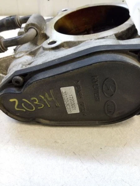 Hyundai Entourage 2007 cuerpo del acelerador fabricante original usado probado 351003C200 Foto 3 de 4