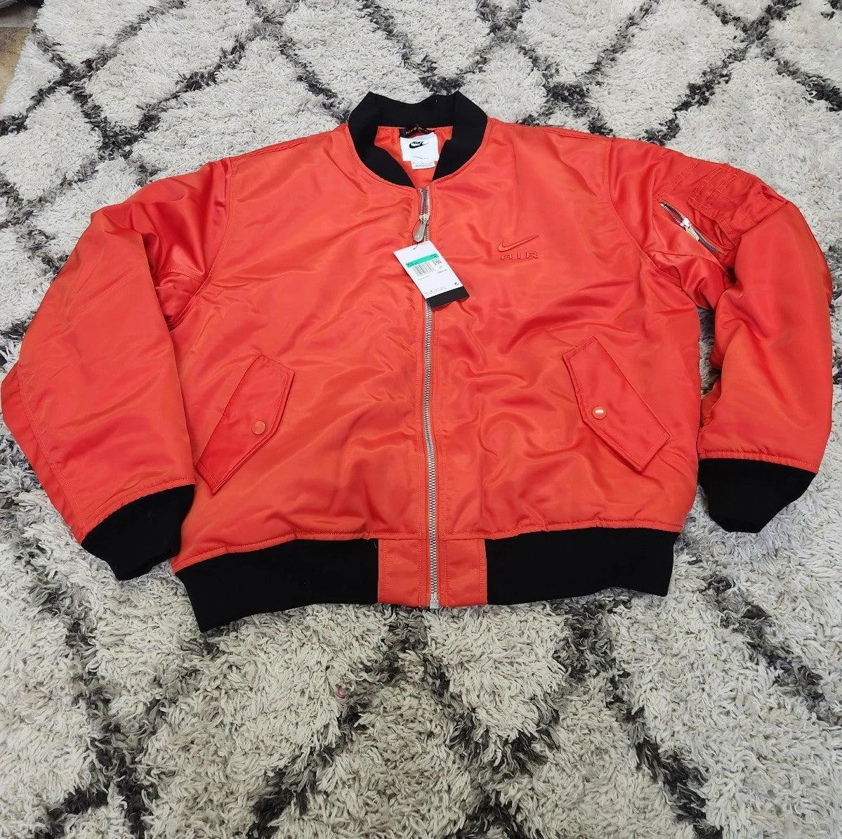 Bomber jacket with store red tag