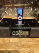1 Blue & 1 Purple IPod Nano & IHomeIH9 Clock/Charger/Speaker working condition 