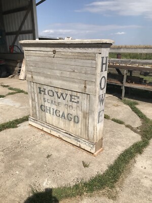 Antique Howe scale with wooden Howe advertising sign case / stand