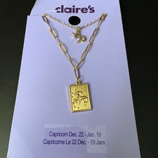 NWT Claires Gold Capricorn Zodiac Layered Set of 2 Necklaces Dec Jan Gift