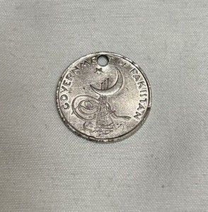 1957 Government Of Pakistan One (1) P    " Holed" Coin.