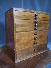 Unusual Vintage 9 Drawer Locking Wooden Dental Cabinet The American Cabinet Co.