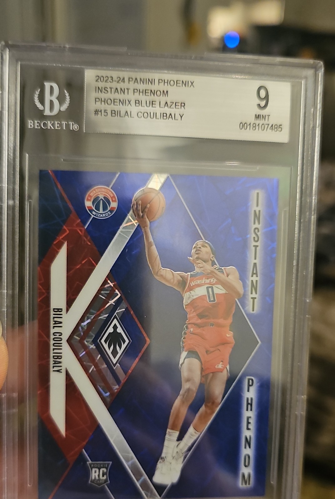 2023-24 Panini Phoenix - Instant Phenom Bilal Coulibaly #15 Blue Lazer /275 (RC)