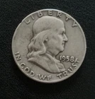 1958-D 50C Franklin Half Dollar Silver. Rim Damage