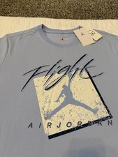 Image of Jordan Boxed Flight Logo Graphic North Carolina Blue shirt DX9593-426