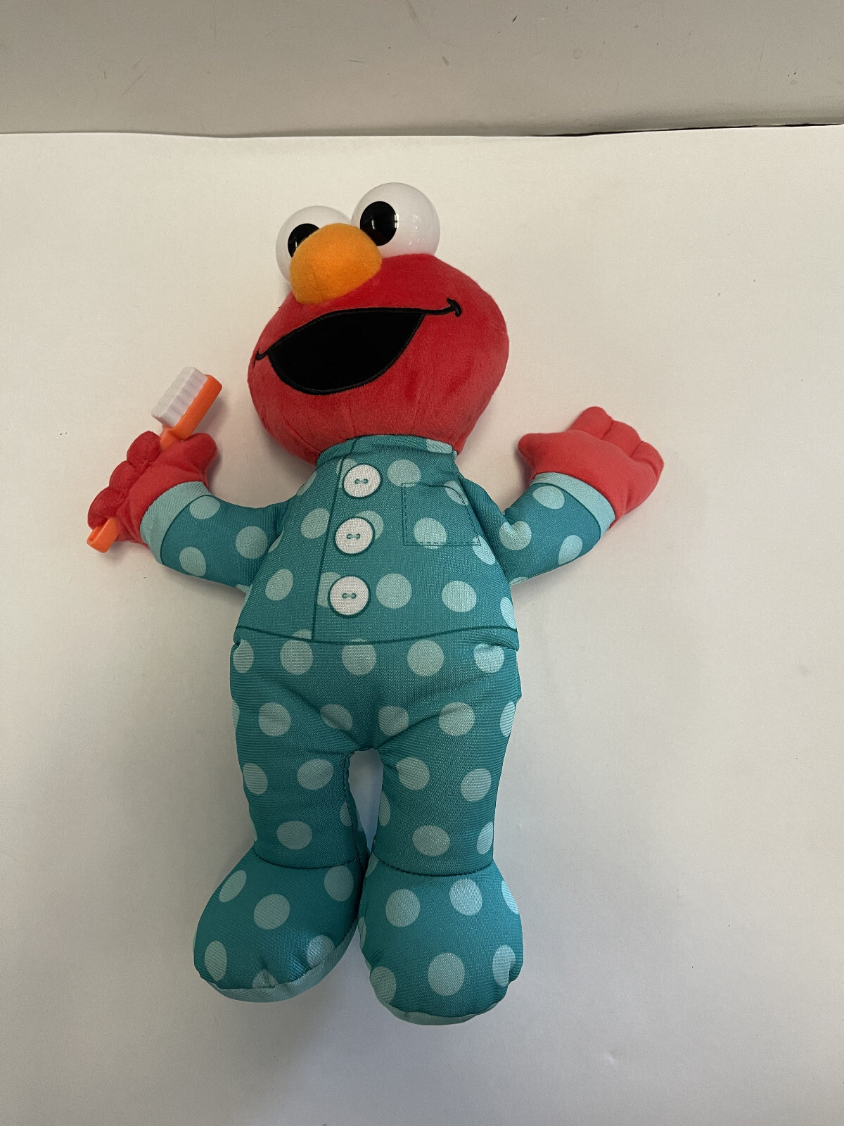 Sesame Street Elmo Brushy Brush Elmo Elmo Sings While you brush Works