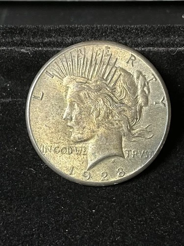 1928 peace dollar Unc Toned