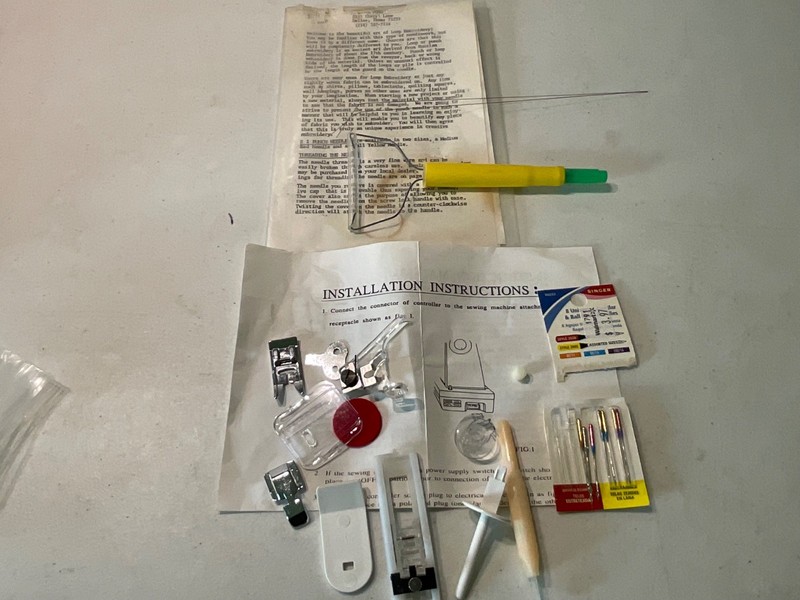NEEDLE THREADER AND NEEDLES USED