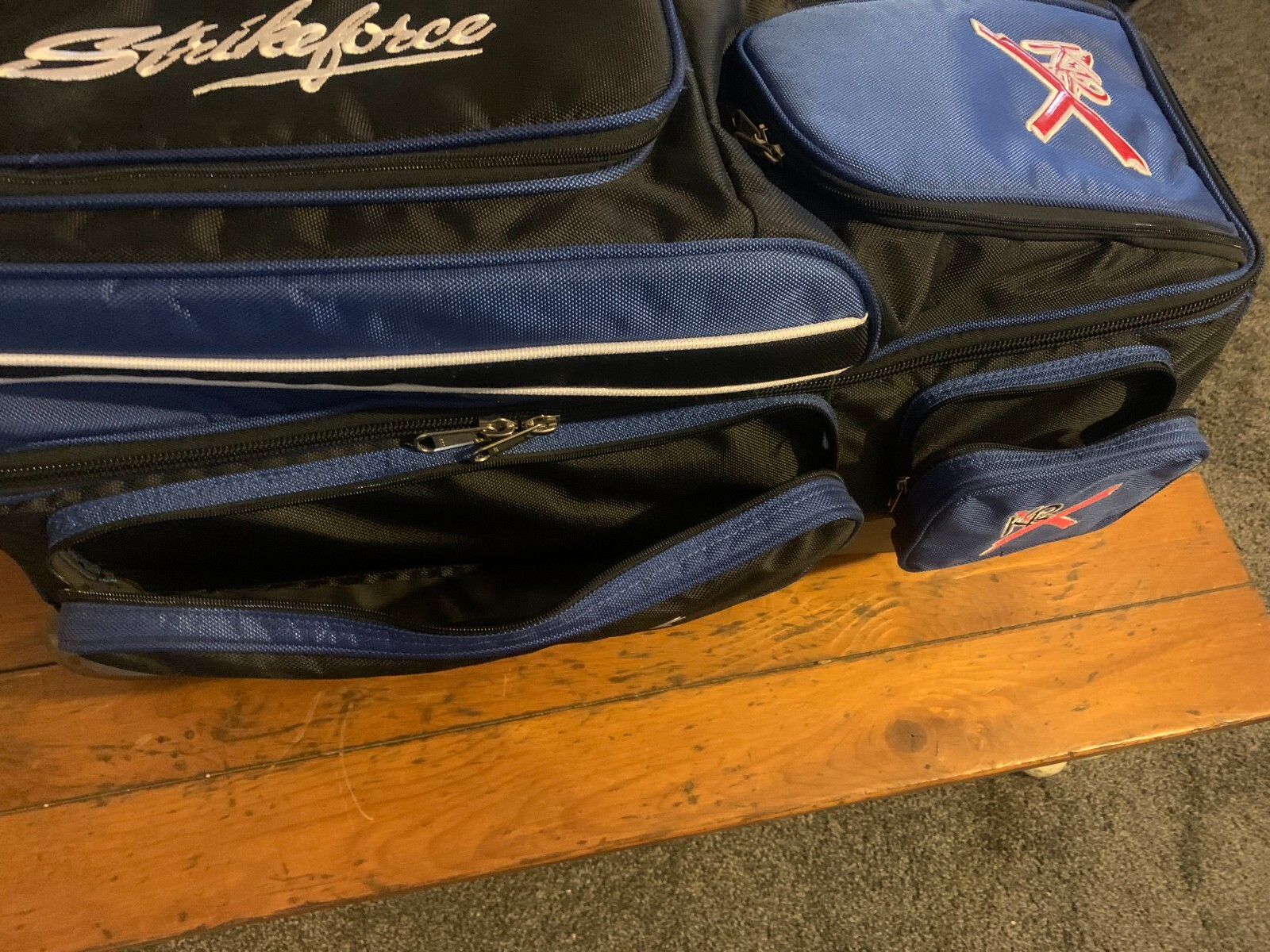 Strikeforce Blue/Black KRX 3 ball bowling bag w/wheels lightly used w/6