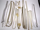 Lot of 15 - Assorted Goldtone/Silvertone Necklaces - Monet, Trifari, Avon, Clair