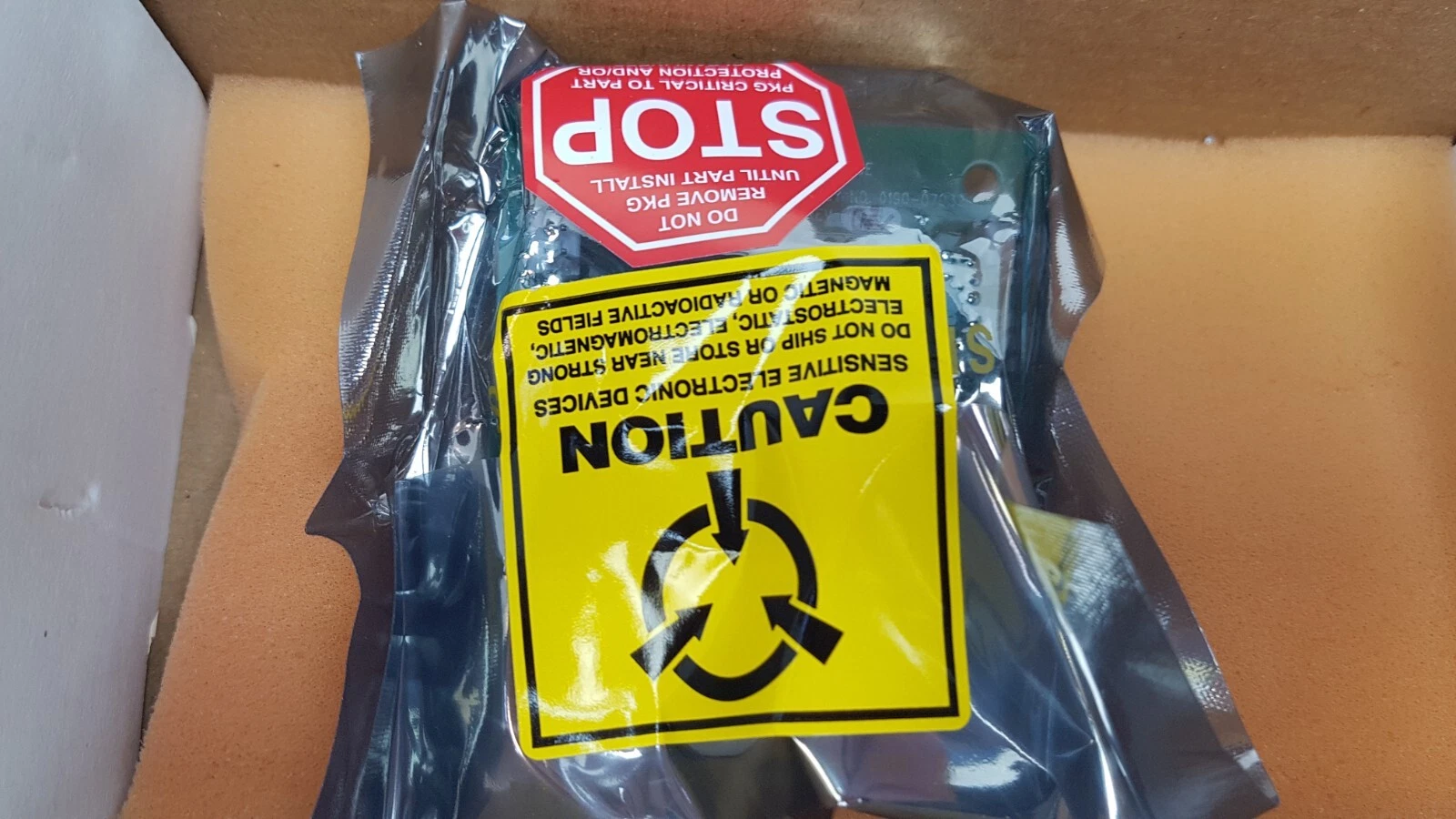 0190-07033 board in its ESD bag with STOP and ESD caution stickers in the foam-lined box