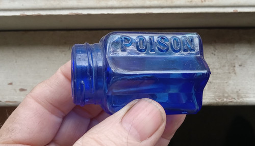 COBALT 6 SIDED STAR SHAPE POISON EMB BOTTLE OVER 100 YEARS OLD