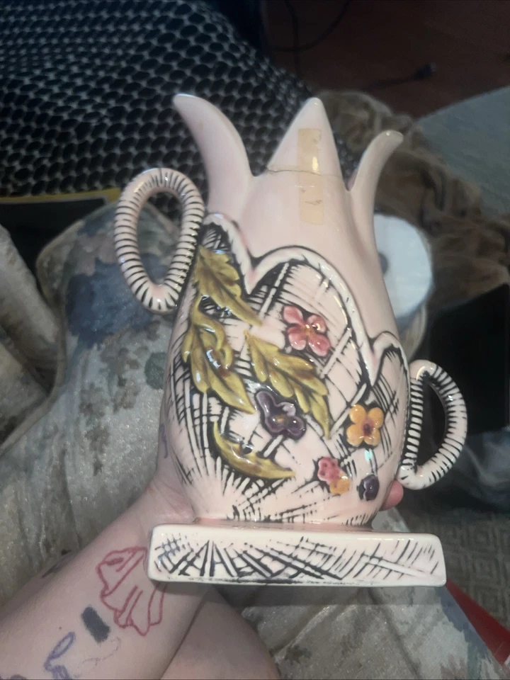 Patrón Blossom Flite", caracterizado por una base rosa con "tejido de cesta" negro Foto 3 de 4