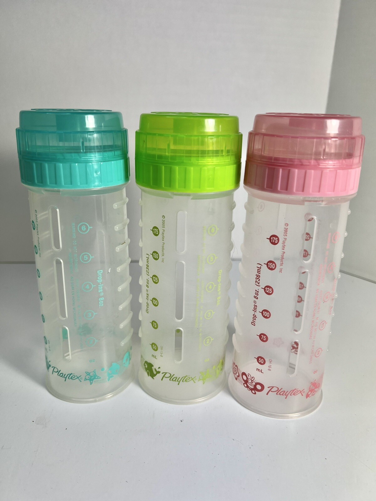 3 VTG Playtex 1990’s Drop In  Printed Bottles. 3-8 Oz. Rings/Caps. No Nipples