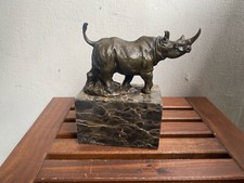 Bronze sculpture  Walking Rhinoceros on a black marble base after Milo
