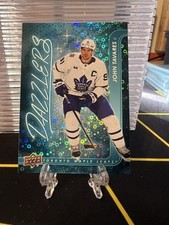 2024-25 Upper Deck Series 2 #DZ-57 JOHN TAVARES Blue Dazzlers Maple Leafs