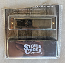Silver Creek Black Gold Harmonica In The Original Case. Size 4 1/8" Clean.