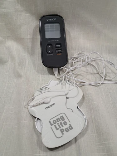 Omron 10 unit with pads, excellent working order and with batteries VWX