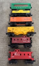 Lot of 6 Vintage Lionel O Gauge Train Cars Rolling Stock Baby Ruth Logs Caboose