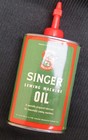 UNOPENED VINTAGE SINGER OIL CAN 3 FL. OZ - NEW OLD STOCK — photo 1