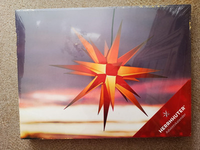 Herrnhuter Sterne Weihnachtskalender Adventskalender orange weiß 2023 NEU OVP