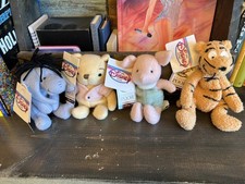 Lot of 4 Classic Winnie the Pooh Disney Store Mini Bean Bag Plush NEW with tags