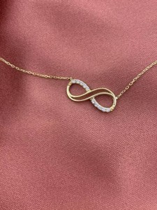 Authentic Round Cut Simulated Diamond Stunning Infinity Pendant In 14K Yellow Gold Plated