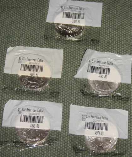 (5) $1 Silver American Eagle Uncirculated 1oz Fine Silver Dates 1993 99 00 01 02