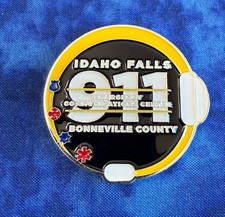 Moneda despachadora del Centro de Comunicaciones de Emergencia 911 de Idaho Falls Bonneville Co.