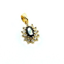 9ct  Yellow Gold Blue Sapphire  Oval Pendant surrounded by c/ z
