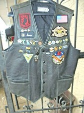 LEATHER MOTORCYCLE VEST WITH PATCHES AND MILITARY PINS LG