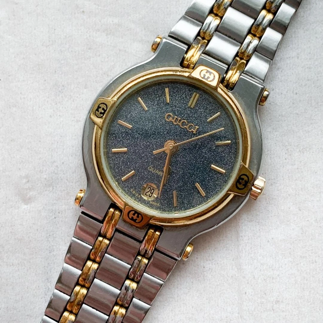Montre femme Gucci 9000L ton or classique état de fonctionnement