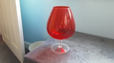 UNMARKED LARGE CLEAR AND RED BRANDY GLASS FOR DECORATIVE PURPOSES