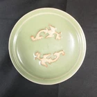 P0941: Chinese celadon porcelain plate with appropriate relief of two fish