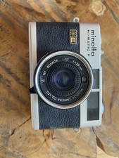    Minolta Hi-Matic F Silver 35mm Film Camera with 38mm f/2.7 Lens   