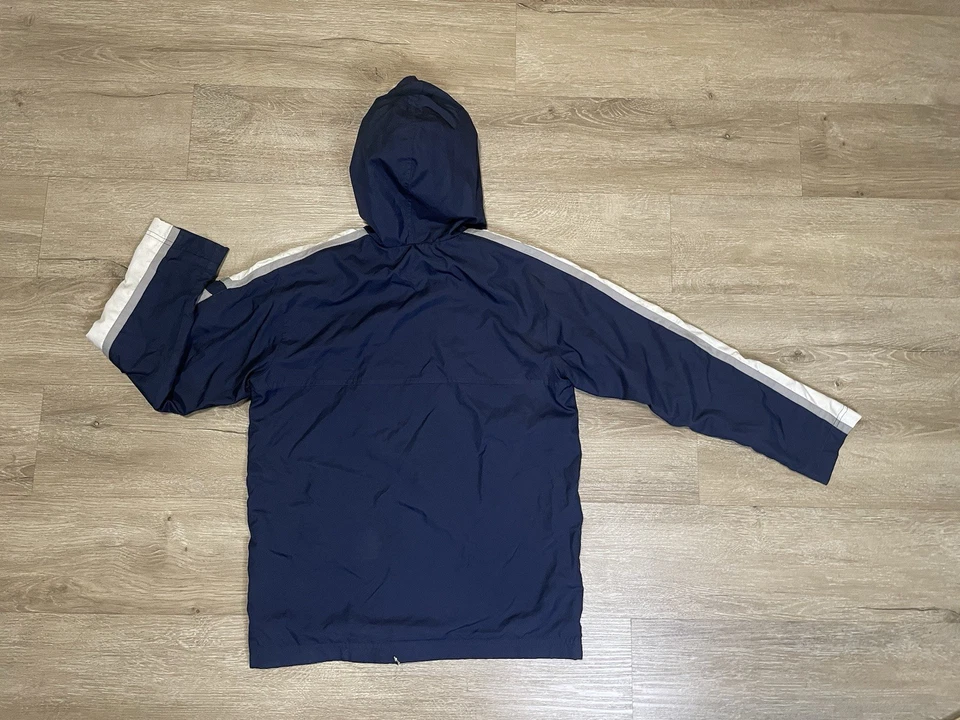 Chaqueta cortavientos Nike vintage años 90 juvenil talla M 10-12 Y2k azul nailon retro ropa de calle Foto 2 de 4