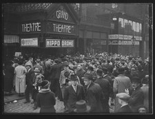 Crowd gathers outside the Grand Theatre to welcome the return of l- Old Photo