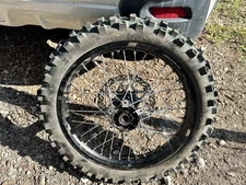 Surron Ultra Bee 2025 Wheelset with CST Tires. Front: 19 x 1.4 Rear: 18 x 2.15